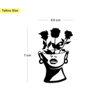 Gesichtsvase mit Rosen