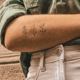 Drie kleine Bomen Tatoeage