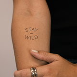 Stay wild tatouage rond 