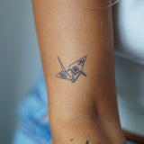 Tatouage oiseau en papier