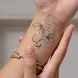 Tatouage de fleur de naissance violette de février