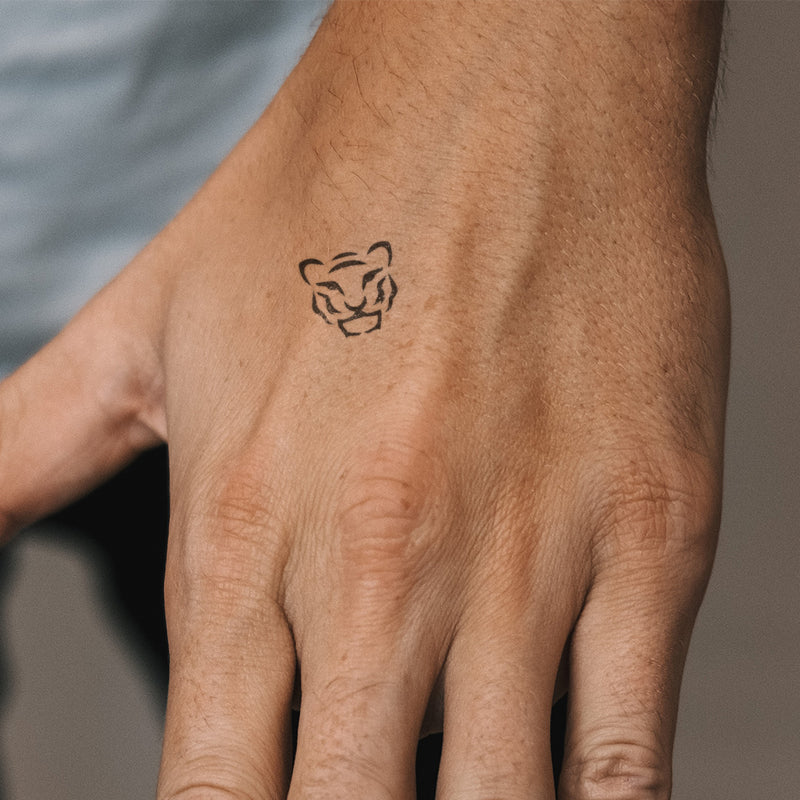 Petit tatouage tête de tigre 