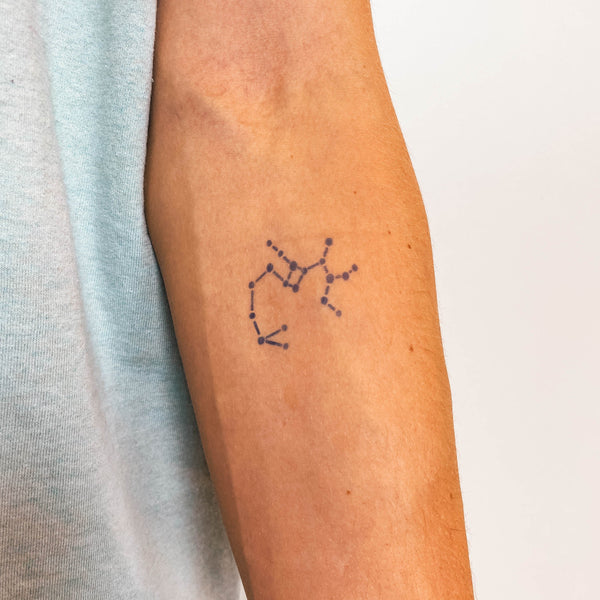 Le tatouage de la constellation du Sagittaire 